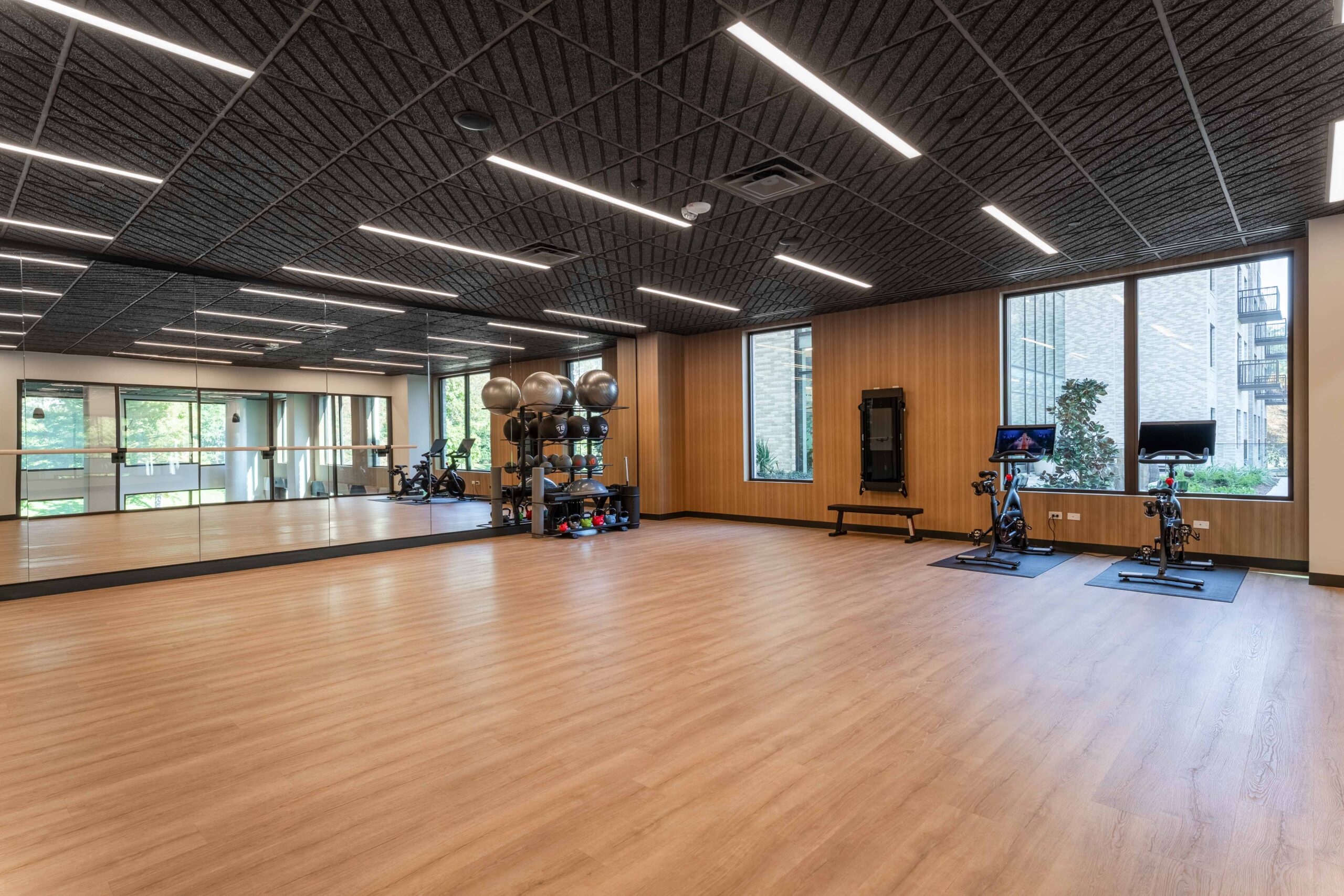 Spacious, modern fitness studio interior.