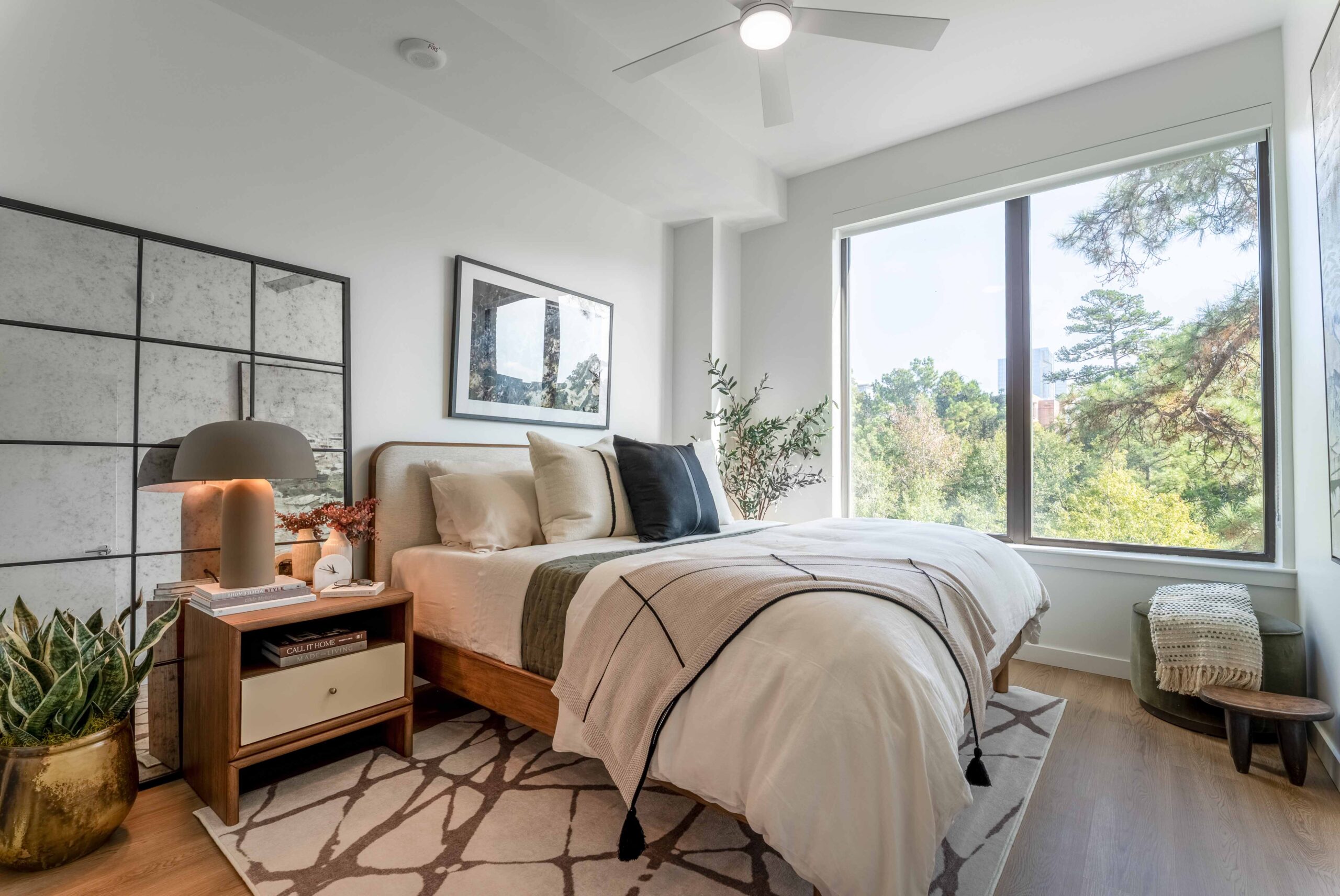 Modern bedroom with large window