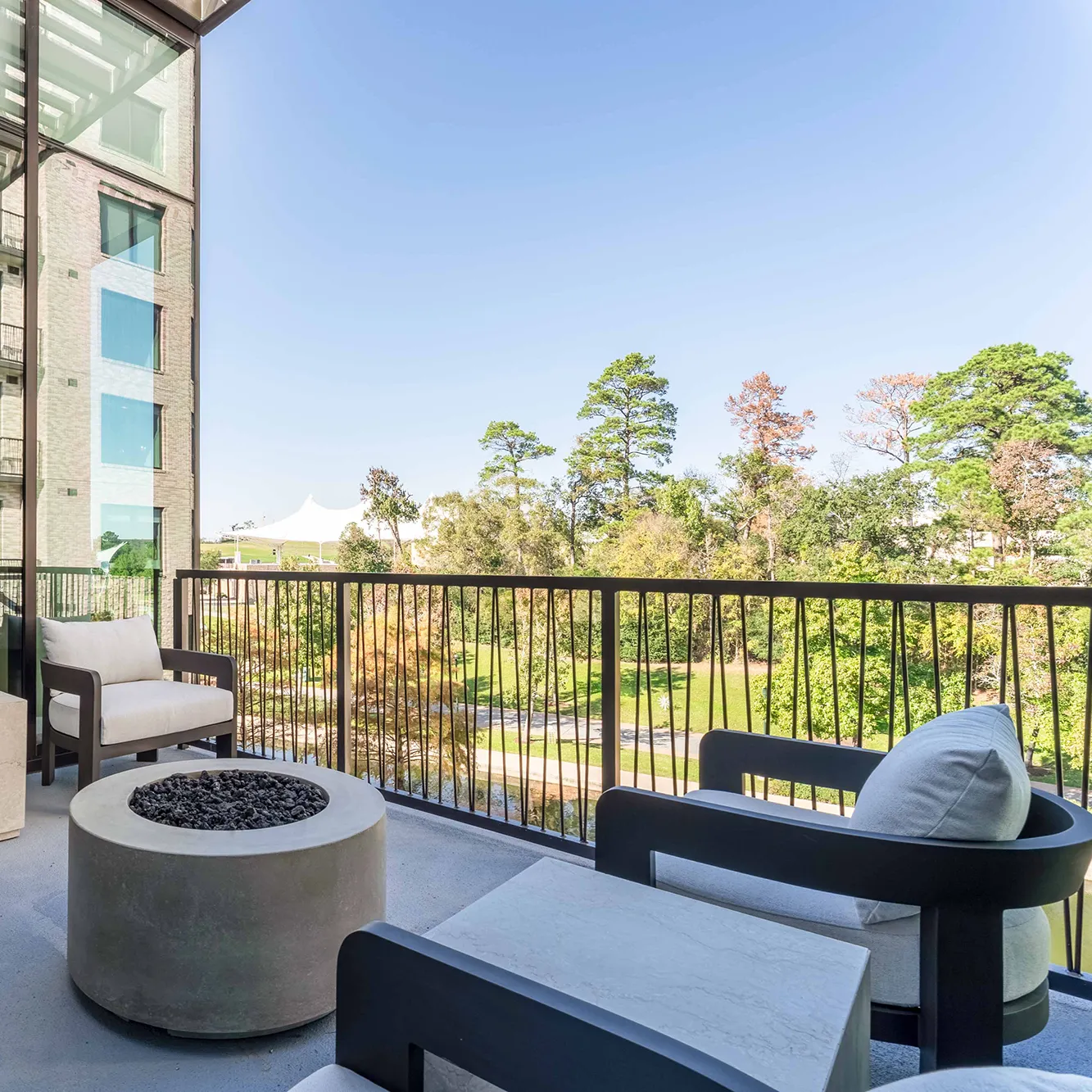 Balcony with seating and greenery view